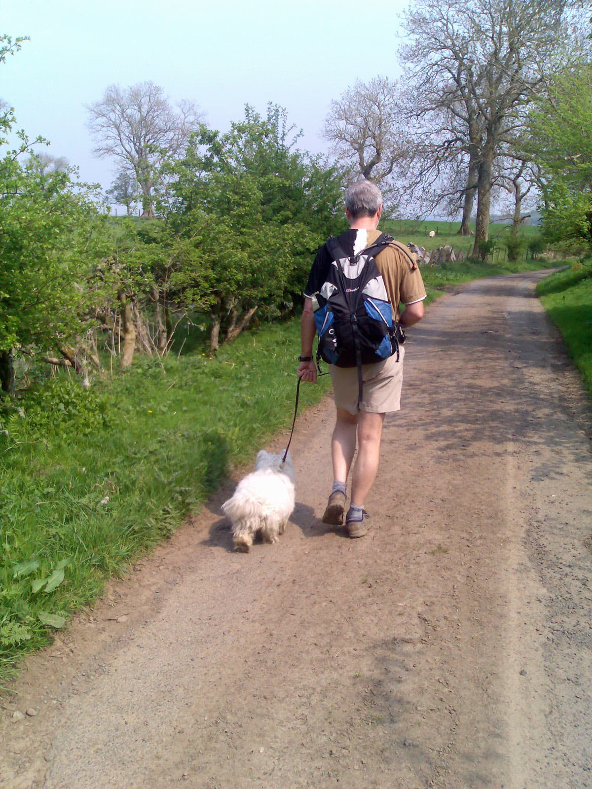 Pips likes this photo because of our matching foot position.  Dog and man in perfect harmony.