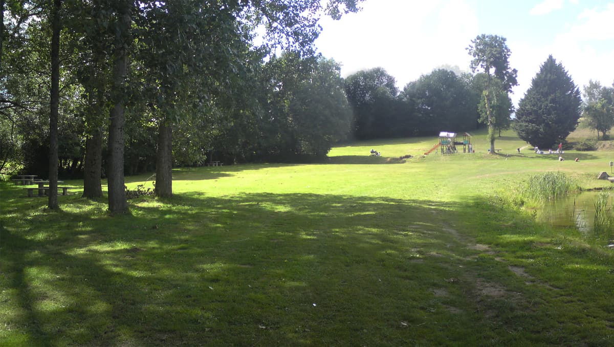 The lake next to the campsite was landscaped, had a picnic area, a play area for kids and a sandy beach.  Click on this photo to see a bit of a panorama of the other side of the lake. 