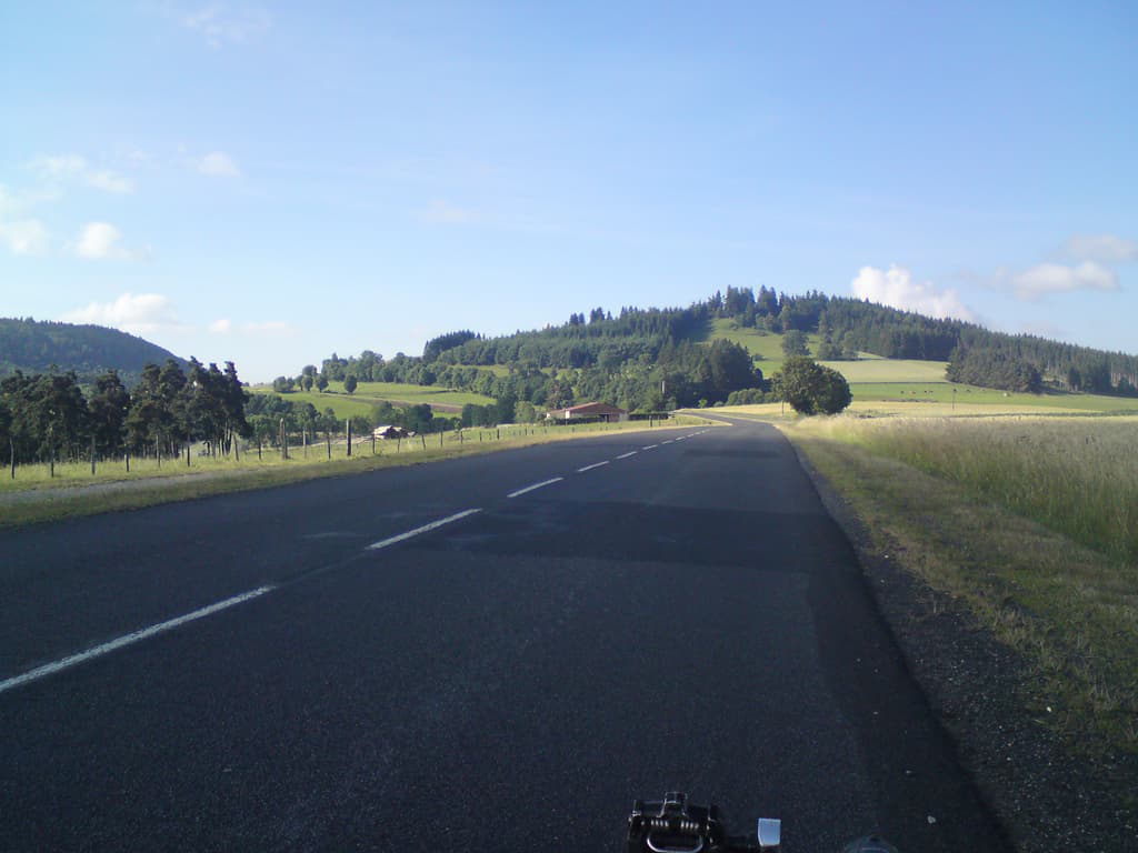 <p>8.00am  I'd met a cyclist just coming onto the main road and we'd chatted for a bit as we rode: he was curious about the bike, but he also showed me the right road, the D13 that I needed to turn off on.  As has often been the case it's perfect tarmac, few cars and easy riding, at least easy to begin with.</p>