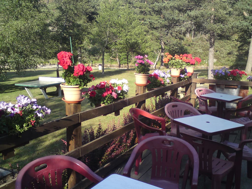 It was a pretty campsite though I almost gave up on it, the sign said 500m, after 2km another sign said, 500m, after 3km I finally came to it.<p>The campsite was next to a stream, the owners were very welcoming and the food they cooked was great.  This photo is the small terrace next to the bar, looking out onto the park/playground.<p>The only downside was that I had to walk 500m further up the hill to get a phone signal to phone home.