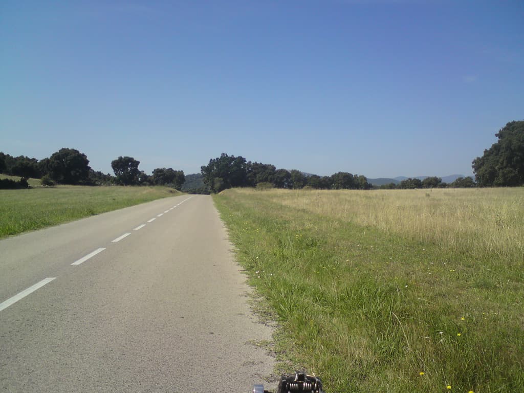 9.41am  I just loved being in Spain, and in this part of Catalu&ntilde;a the grass was still grass and it wasn't spiky.  However, it was getting hotter and hotter and it was still before 10 in the morning.<p>I stopped for lunch around 12.00, I had to, I needed the fuel.  I had snails and pigs feet in a nice little restaurant in Pont de Molins that specialised in such things.  They were all very nice to me, putting the bike in the shade in the courtyard and bringing me lots of cold water to drink.