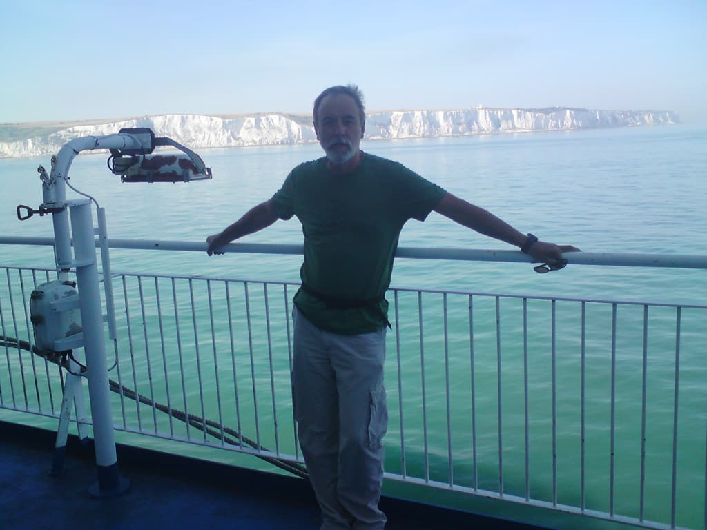 with the white cliffs in the background and a beautiful, calm sea.