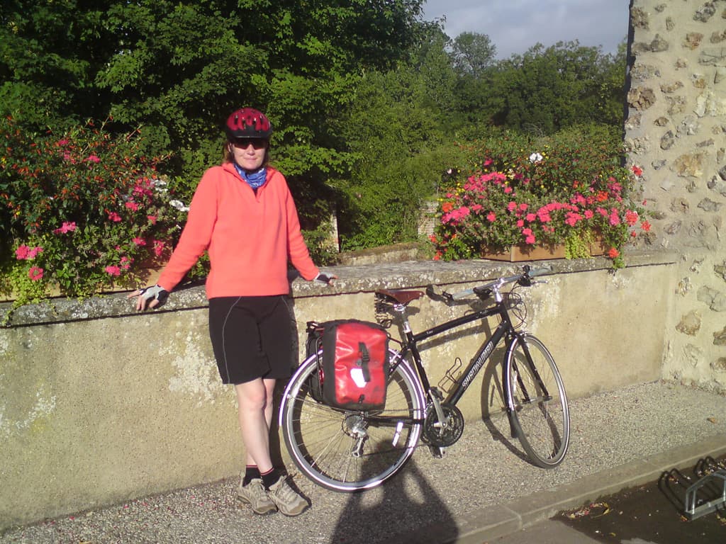 Is how Bonneval billed itself.  Here's Pips leaning next to the ever-present pretty flower display's that were in every french town, this one just in front of the canal that ran around the town.  On which you could hire an electric boat, which we meant to do but never quite found the time.