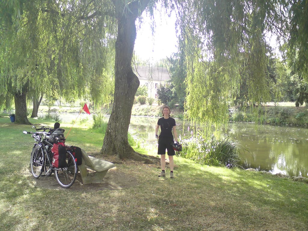 and just opposite is the river.  It was a gorgeous spot so we stopped and rested for a while under a weeping willow.<p>We had thought of having lunch here, according to the map there is a restaurant but we couldn't find it and so decided to go onto Marbouie.  A mistake really.  The restaurant wasn't that good and it was on a main road which we then had to cycle along for a short while before being able to turn off onto quiet back roads.  In fact the main road was fine, the French drivers, as alway's, very considerate, but it was the first time for Pips and she was a little nervous at first.