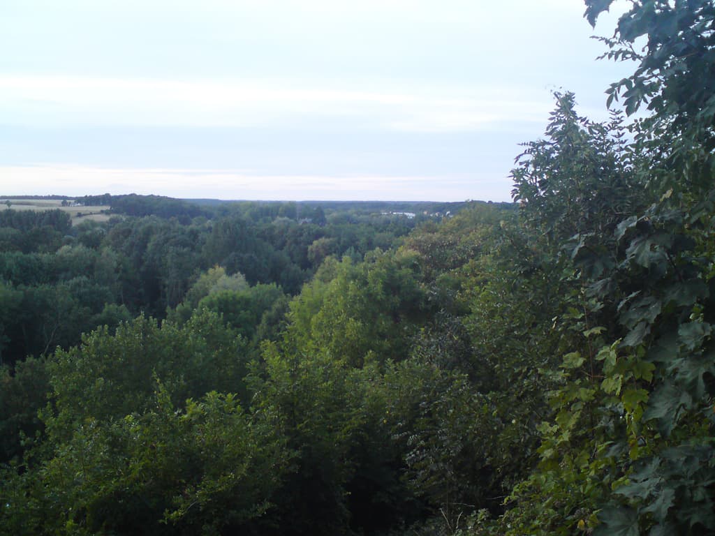 We really liked the campsite at Chateaudun but I don't have any photos of it.  It was small, and the ground level and grassy, so it was particularly comfy for a tent.  Also, our particular pitch had no one close by so it was private too.<p>It was about 15 minutes out of the town and to get there, which we did that first night, it was a nice walk up some steps by the chateau, with this view over the valley floor.<p>We found a very nice Moroccan restaurant where we ate so well that we went back the next night.