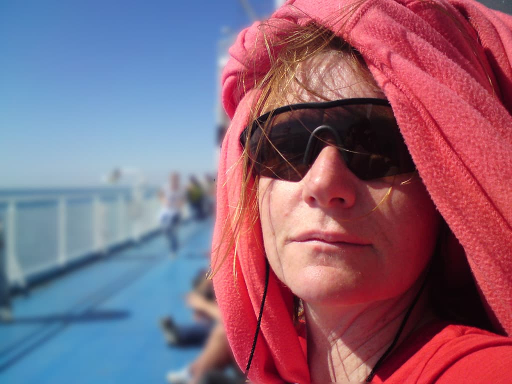 So exotic.\r\n\r\nActually it was the wind, just strong enough that it got in your ear and was a bit tiring until I hit on the idea of wrapping clothes around our heads.  It's not just the French who're stylish y'know.