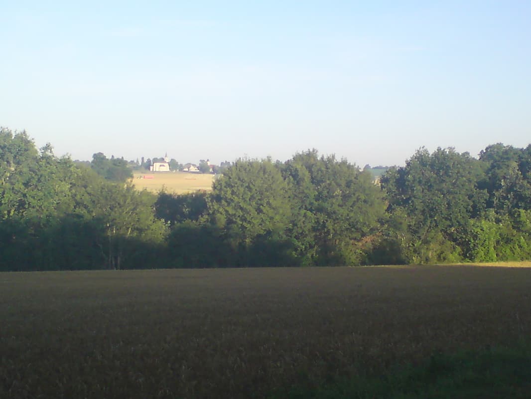 <p><em>8th July.&nbsp; 87km, avg 16.5km/hr, max 61.9km/hr, 5 hrs riding but 8 hours total.</em></p><p>This photo, taken at 6.30am, doesn't quite show the terrain because it turned out to be a tiring day.&nbsp; Long steep hills followed by a flat bit then down and another steep hill again.&nbsp; Lumpy, coarse tarmac too, which slows you down badly even on the flat, all of which meant that by 12 I'd only done 50km.&nbsp; I was better after food, not because of the food but because the tarmac was better, and it was a bit flatter.</p>