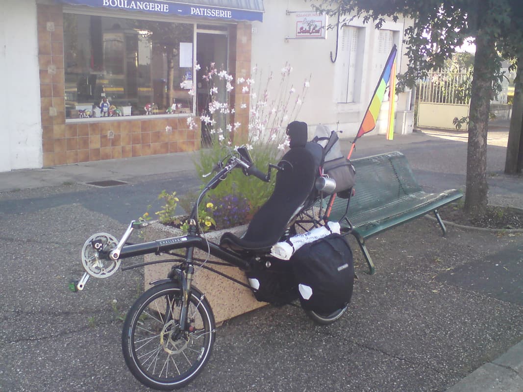 <p>Three things of interest here, the boulangerie/patisserie, the bike, and the unusual municipal flower planting.</p><p>Patisseries have to be the greatest cycling resource, you can get savoury pies, flans and cakes, bread and biscuits, but also croissants aux amandes.&nbsp; I <strong>love</strong> croissants aux amandes.</p>