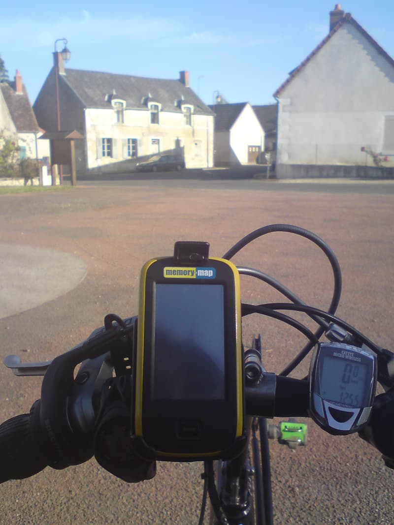 <p>I thought I'd take this photo as I cycled away from my breakfast spot, of the view I have in front of me on the bike.&nbsp; My watch to the left, the GPS, which greatly eased the problems I had last year when navigating the miriad of tiny, unsigned commune roads which I follow, and, on the right, the cycle computer for speed and distance info.</p>