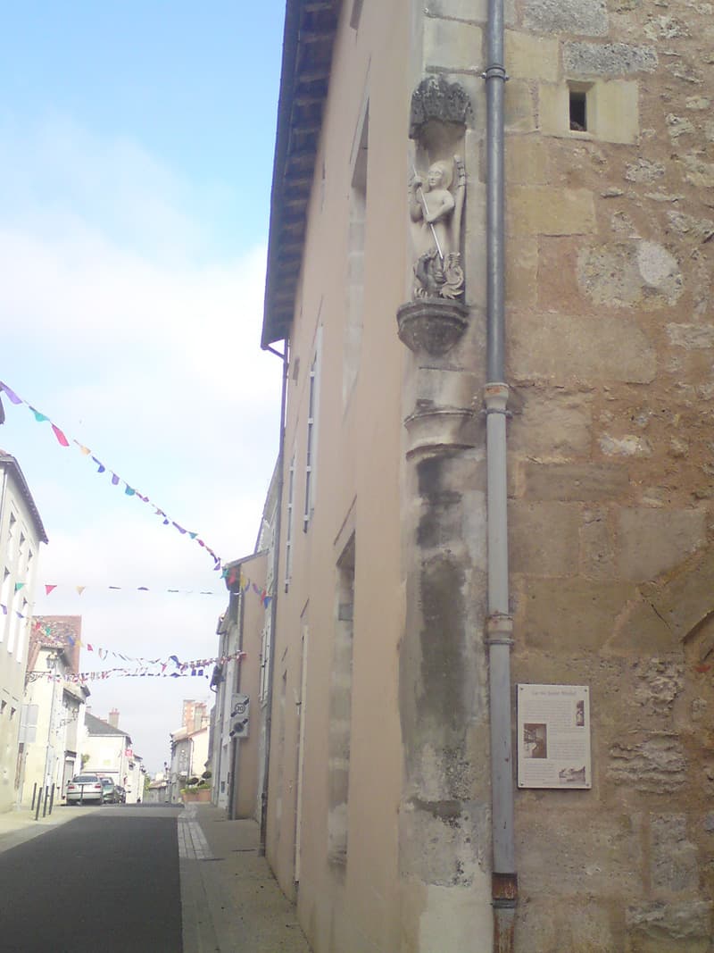 <p>I was quite taken with this stone figure dispatching a dragon with his spear.&nbsp; Lussac was quite a pretty town.</p>