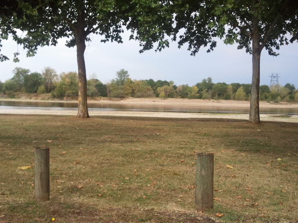<p>Nice photo of sign, click and see the Loire but an hour later. &nbsp;Sorry for the cheat but flowers so lovely and it was almost the last of the Loire before I switch rivers at Nevers to follow the Allier.</p>