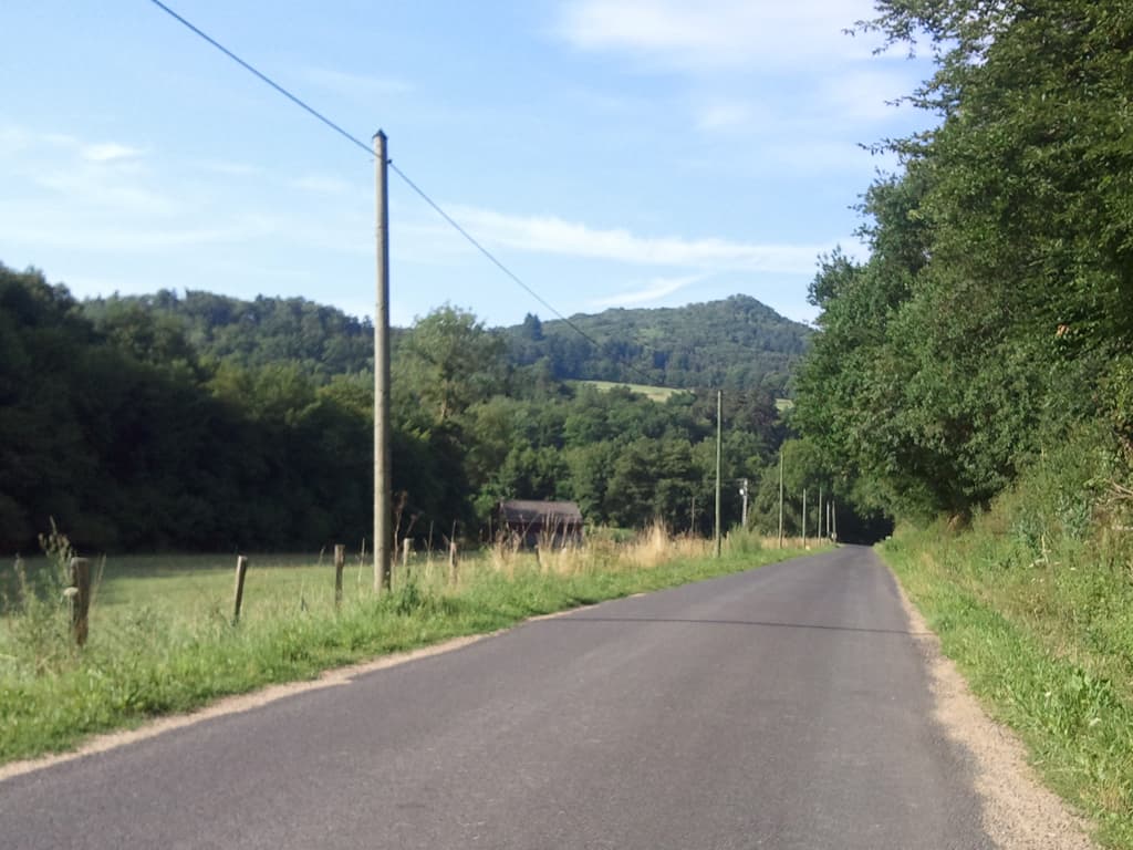 <p>Quiet country lanes, green, trees and pointy hills.</p>