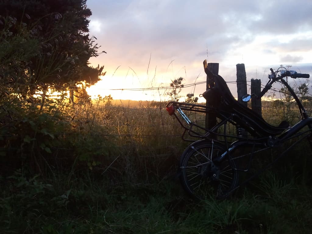 <p>I opened the front of the tent to see this. &nbsp;It was one of the few times I'd had a pitch that combined all the things I mentioned earlier, one of which was "early morning sun".</p><p>As I got packed up Philippe Lasnier, who'd arrived later on Sunday afternoon, was also up and we got to have a bit more of a chat. &nbsp;I'd met Philippe the previous year when he'd shown me where the campsite was to be found in Moissac. &nbsp;He'd come up from Agen with a friend, both on ICE trikes.</p><p>He had a fairly complete setup, though heavy I guess for that. &nbsp;He had smart little gadgets like a calibrated spirit level to tell him the gradient of the hill he was on, solar panels, a trailer, hand-made, a roomy tent with a large tarp to make a cooking and seating area. &nbsp;He even had a small ukulele which serenaded me to sleep the previous evening. &nbsp;Philippe has his <a href="http://www.as3r.fr/presentation.html">own site</a> with some good pictures in case you're interested.</p>