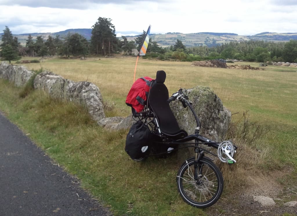 <p>If you look at the flag pole on my bike you can see how windy it is, it's bending the flag quite a lot. &nbsp;It's also not alway's that warm either, my jacket, that red thing, is out.</p>