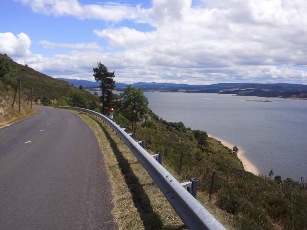 <p>Langogne is at the end of this, the Reservoir de Naussac. &nbsp;This was a largely descending road on fast tarmac into Langogne.</p><p>I had thought I might stay at Langogne, the town itself looked worth exploring. &nbsp;I went to the tourist office and got some info and cycled out to the campsite. &nbsp;The campsite though was quite a way out of town, it was unmanned with no facilities and I just didn't fancy it. &nbsp;I also knew that it wasn't too far, 30km, to La Bastide Puylaurent which has a really nice campsite. &nbsp;One I'd stayed at a couple of years ago. &nbsp;So I left the campsite, went back into Langogne and set off again.</p>