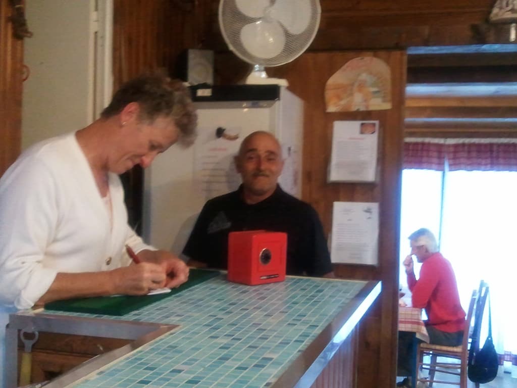 <p>A pity my photo has come out blurred but you get the idea, happy smiling hosts who just make you feel at home. &nbsp;And that's not even to start to mention the superb mushroom omelettes that they make, with fresh wild mushrooms they pick.</p><p>So, I got my washing done, had a demi-p&ecirc;che, then the set meal with my usual petit pichet de ros&eacute;. &nbsp;Actually when the cheese arrived once again I was given a pichet of red wine to eat it with, it's obviously important in France. &nbsp;It was good cheese, I said that it was as good as many English cheeses, jokingly of course, to which he simply said 'haagh'.</p><p>There was an interesting parallel story going on back in England. &nbsp;Pippa had rescued a seagull with an injured wing and was keeping the bird in a cardboard box in the house, waiting for the RSPB to come and take it away. &nbsp;I was trying to translate and explain this drama of girl and bird to the owner.</p><p>I think that seagull is mouette which I pronounced as mouyette I think it was, which the guy explained is actually dippy egg with soldiers. &nbsp;Anyway, the cause of much laughter, english woman rescues dippy egg.</p>