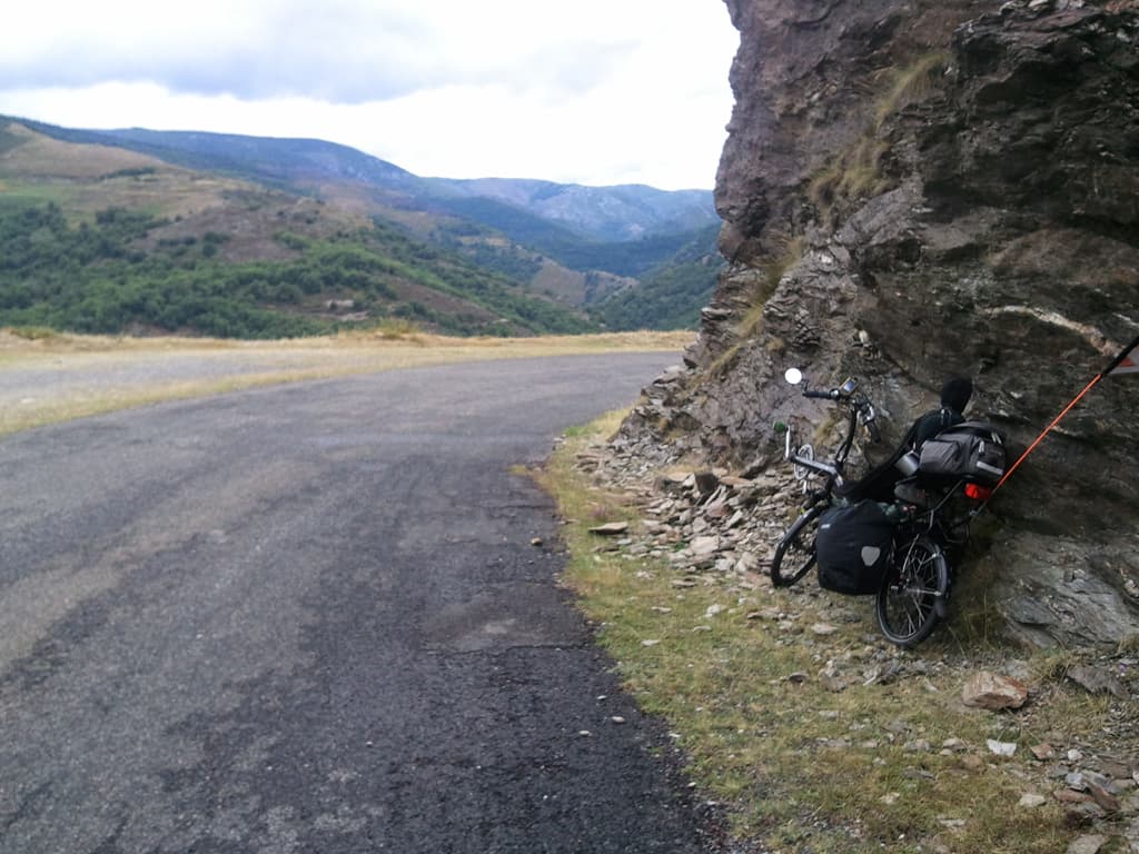 <p><strong>Tuesday 19th July. &nbsp;La Bastide Puylaurent to Les Vans: 45km, avg 20.1km/hr, max 49.3km/hr, 2.14hrs riding</strong>.</p><p>Out of La Bastide I took the D4 then turned off onto the D151, a tiny, curving, swooping little lane that takes you on what is, more or less, discounting the odd 50m bit of uphill, 40 odd km of descent. &nbsp;It's fantastic.</p><p>It's a long descent but because the tarmac is sometimes a little worn and the curves tight and blind you can't really let rip so my max speed isn't that high. &nbsp;Nonetheless I wasn't hanging around. &nbsp;In part because I was keen to get a phone signal, there was none for most of the descent, in order to book a table for lunch at La Feuille de Chou, a restaurant I'd been to before in Les Vans. &nbsp;I'd decided today was going to be a short day and I'd stay in a hotel too, perhaps even swim in the pool if the weather brightened up. &nbsp;Which it didn't by the way.</p>