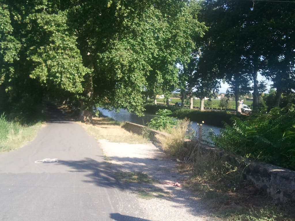 <p>Actually it was with another cyclist near here that I came the closest to having a crash. &nbsp;He was coming from the opposite direction, was chatting to the person with him and simply wasn't looking where he was going. &nbsp;I shouted and he swerved, missing me by literally two inches.</p><p>For the most part though cycling by the canal is a quiet affair, ish, since there are lots of people out on their bikes, jogging, roller-blading and just strolling, at times being on the road is easier. &nbsp;The other slight problem with the canal is that the tarmac on the towpaths is variable, sometimes it's deeply rutted from the tree roots and sometimes there simply isn't any, more problematic with a loaded tourer. &nbsp;I also, frankly, find it a bit boring after an hour or two.</p>