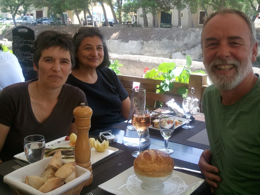 <p>I was really looking forward to this, meeting up with Marie-Laure, who I'd first met when cycling last year near Agen, her friend Carine; and eating at La Tour Sarrazine again.</p><p>We had a very jokey waiter who took this photo for us, actually I think the owner took over since his photo was a bit shakey. &nbsp;This shot on the left is just of the food, click on it to see the diners.</p><p>It was great meeting up again, we had very animated and interesting conversations, largely in French, though helped out occasionally by Marie-Laure and Carine's English (Carine actually teaches English and spoke my language much better than I hers, though she was much too polite to make that obvious).</p>