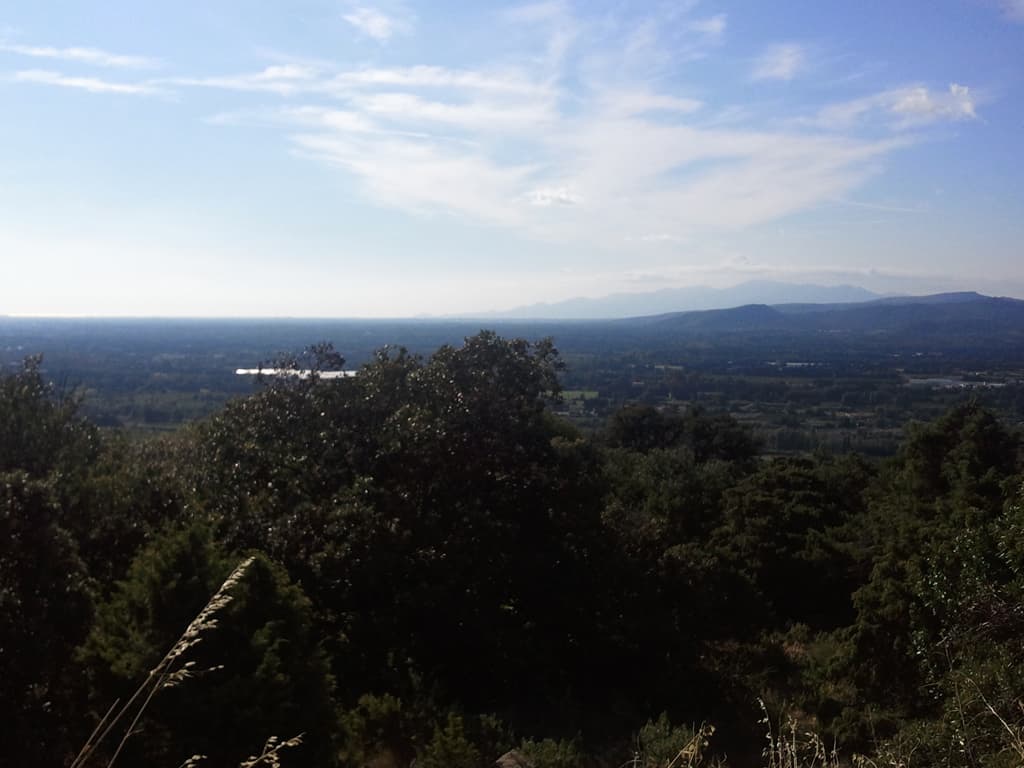 <p>This is the first time I've seen the sea, in spite of being about 500m from it at Vias Plage, and those are the Pyrenees slowly going down to meet it in the distance there. &nbsp;I'd be going over one of those passes tomorrow morning, how exciting.</p>