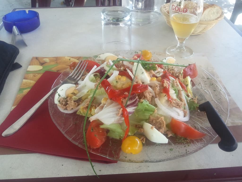 <p>I stopped to buy some nectarines and decided also to eat in the small restaurant nearby.</p><p>The chef's mother was spanish so I chatted to her, which, of course, then completely messed up my French when I came to talk to the waiter.</p><p>Finally, and I can't remember why, probably the bike, I got into conversation with a forester, Raphael, though he spoke to me in Catalan largely or in French but with a strong Catalan accent.</p><p>I arranged that if he saw me the following morning struggling up to Las Illas, where he sometimes worked, he'd stop his van and give me a lift. &nbsp;In fact someone beeped at me just as I was arriving at Maureillas and it turned out to be him saying hello.</p><p>The food, by the way, was good, though it cost me 14&euro;, a bit expensive for what it was.</p>