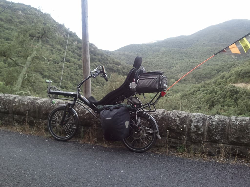 <p><strong>Mon, 25th July. Maureillas Las Illas to Ma&ccedil;anet de Cabreny's: 25km, avg 7.3km/hr, max 58km/hr</strong></p><p>So, the big day, the climb over into Spain. &nbsp;It takes a couple of hours for me to cross over if I remember correctly.</p><p>It's a reasonably nice day and the first part of the ascent is straightforward, though it's a climb. &nbsp;I've done this bit before so I know that it's going to go on and on, and that that bit of sky through that valley isn't the pass into Spain, it's much farther than that.</p>