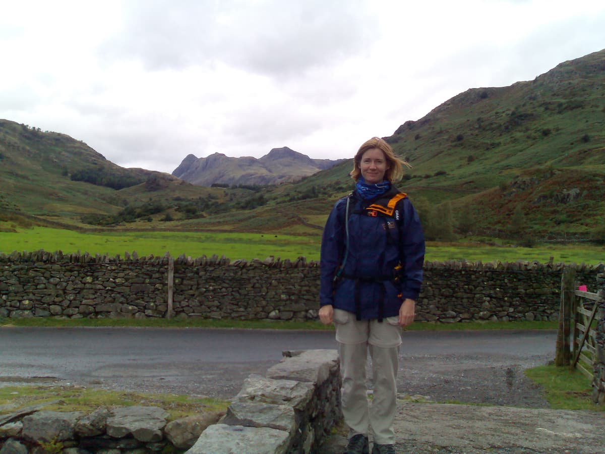 Those are the Langdale Pikes you can see in the distance over in Great Langdale, over the pass.  The little farm we stayed at, Low Foot Farm, was just around the corner and we're just leaving the narrowest road in the lakes to cross over a tiny stone bridge to start our walk.