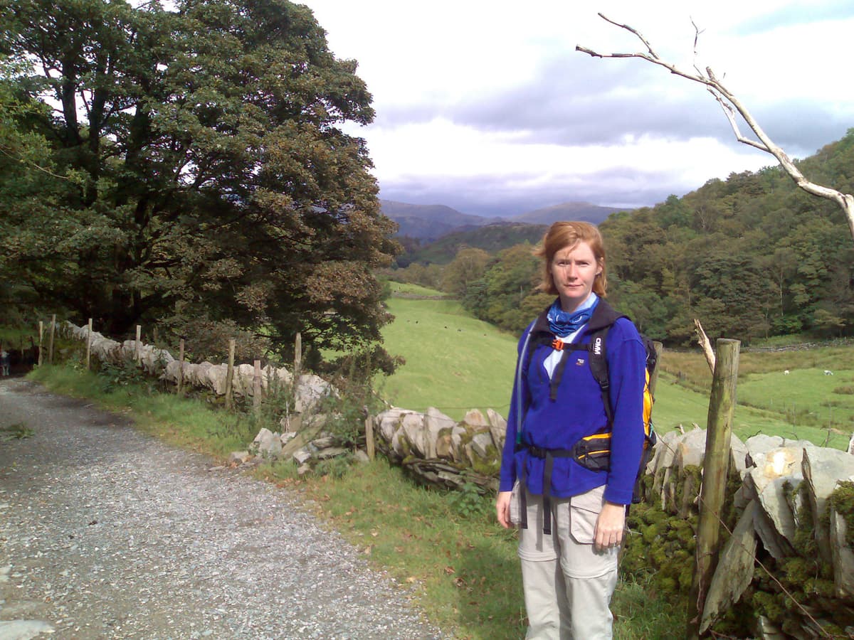 We stroll up a gentle gradient with the weather getting better and better and by the time we had gone down the other side, passing High Tilberthwaite, it was quite good.  This is a view back up the valley towards the Three Shires at Holme Ground.